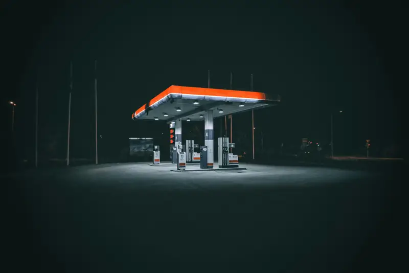 Gas station canopy lit up at night