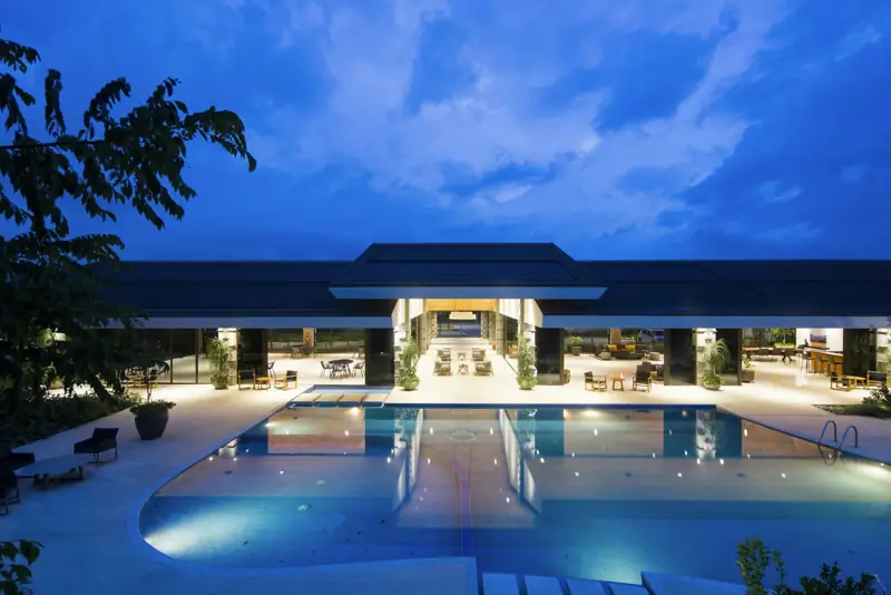 Hotel with pool at dusk