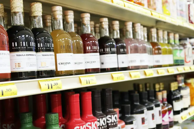 Liquor bottles on store shelves