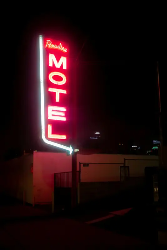 Neon motel sign at night